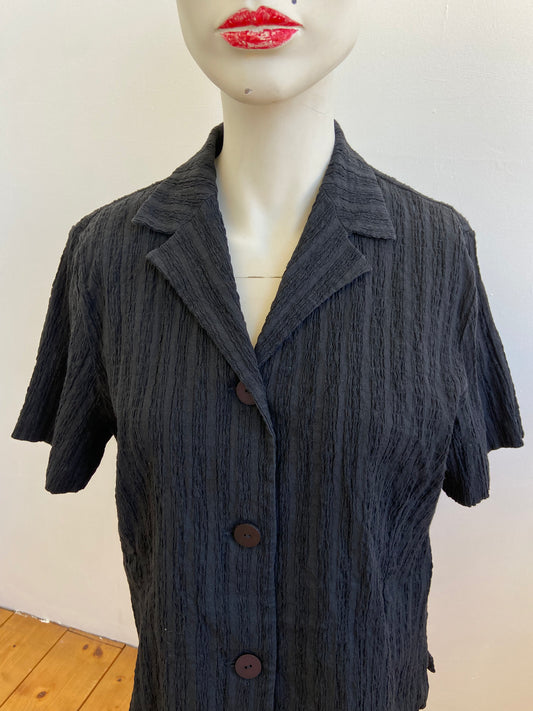 Chemise noire figure libre