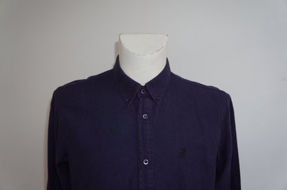 Agnes B. purple shirt