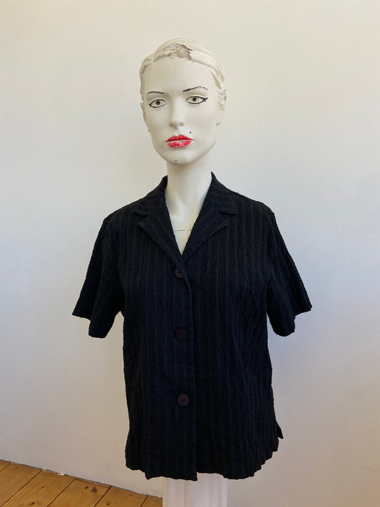 Chemise noire figure libre